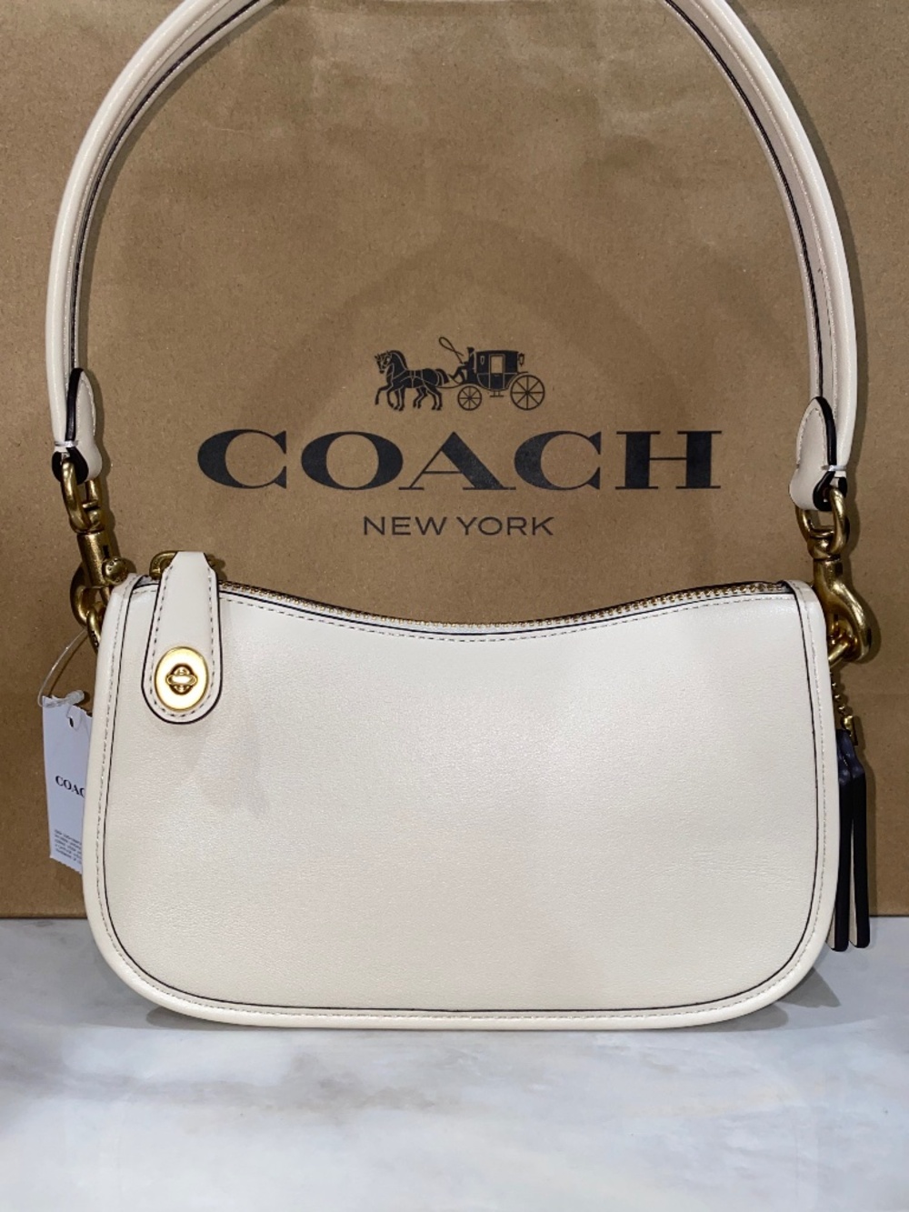 Coach swinger 20 NWT